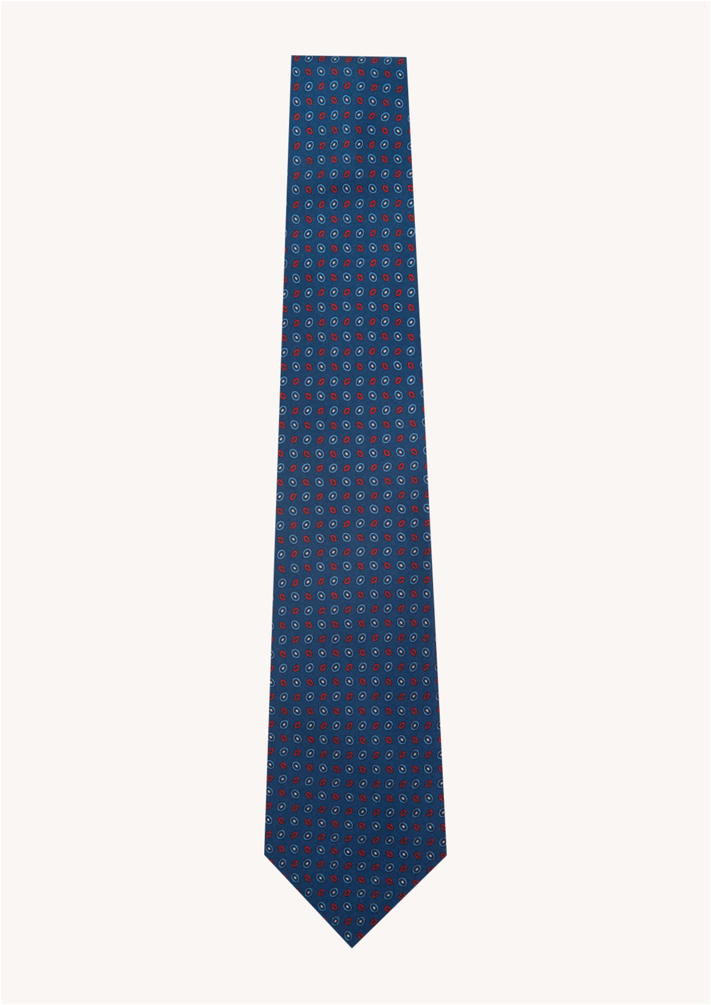 Cravate en twill 100% soie, ornée d'un motif ovale rouge et blanc sur fond bleu