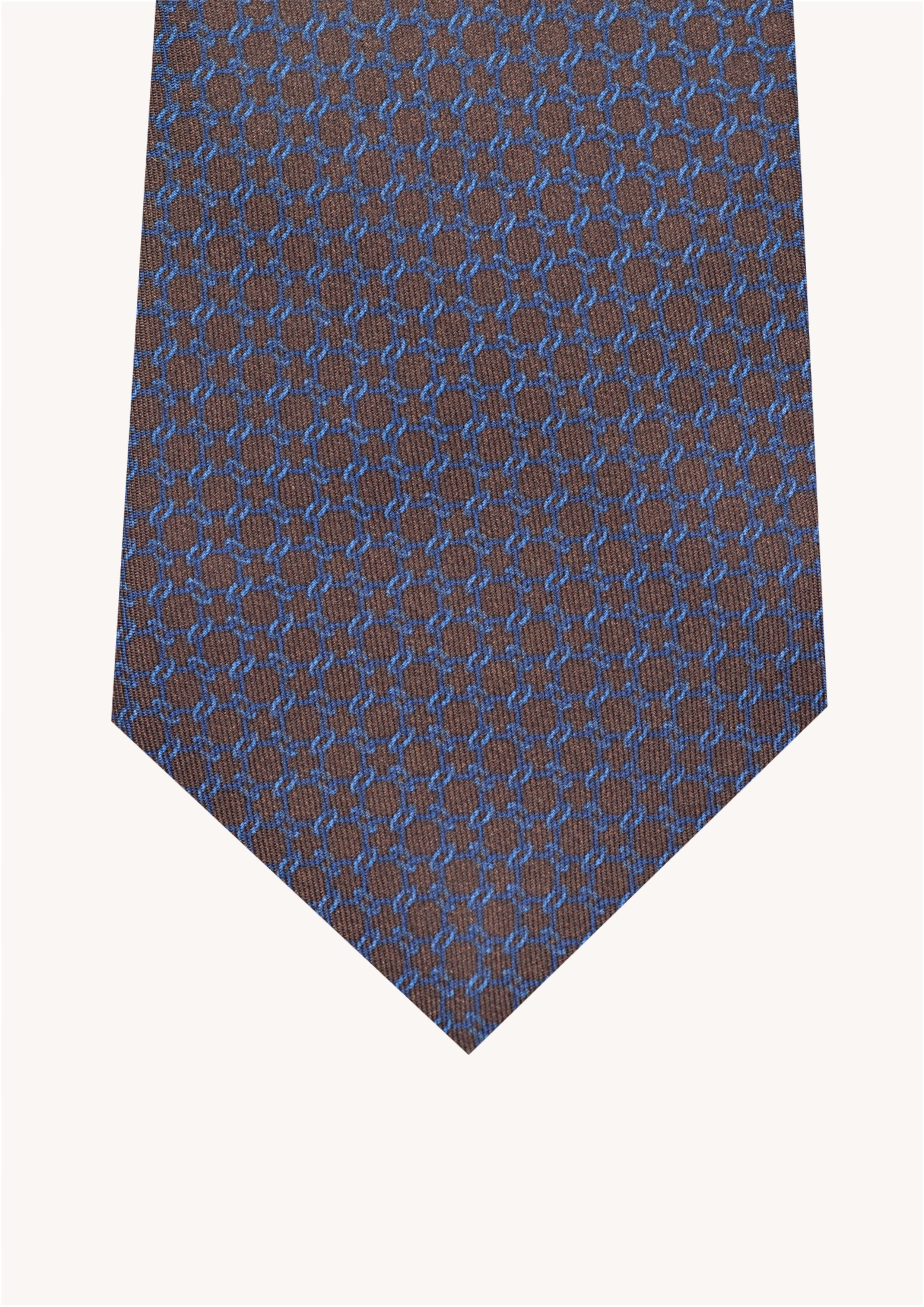 Cravate en twill 100% soie, ornée d'un motif géométrique bleu sur fond marron