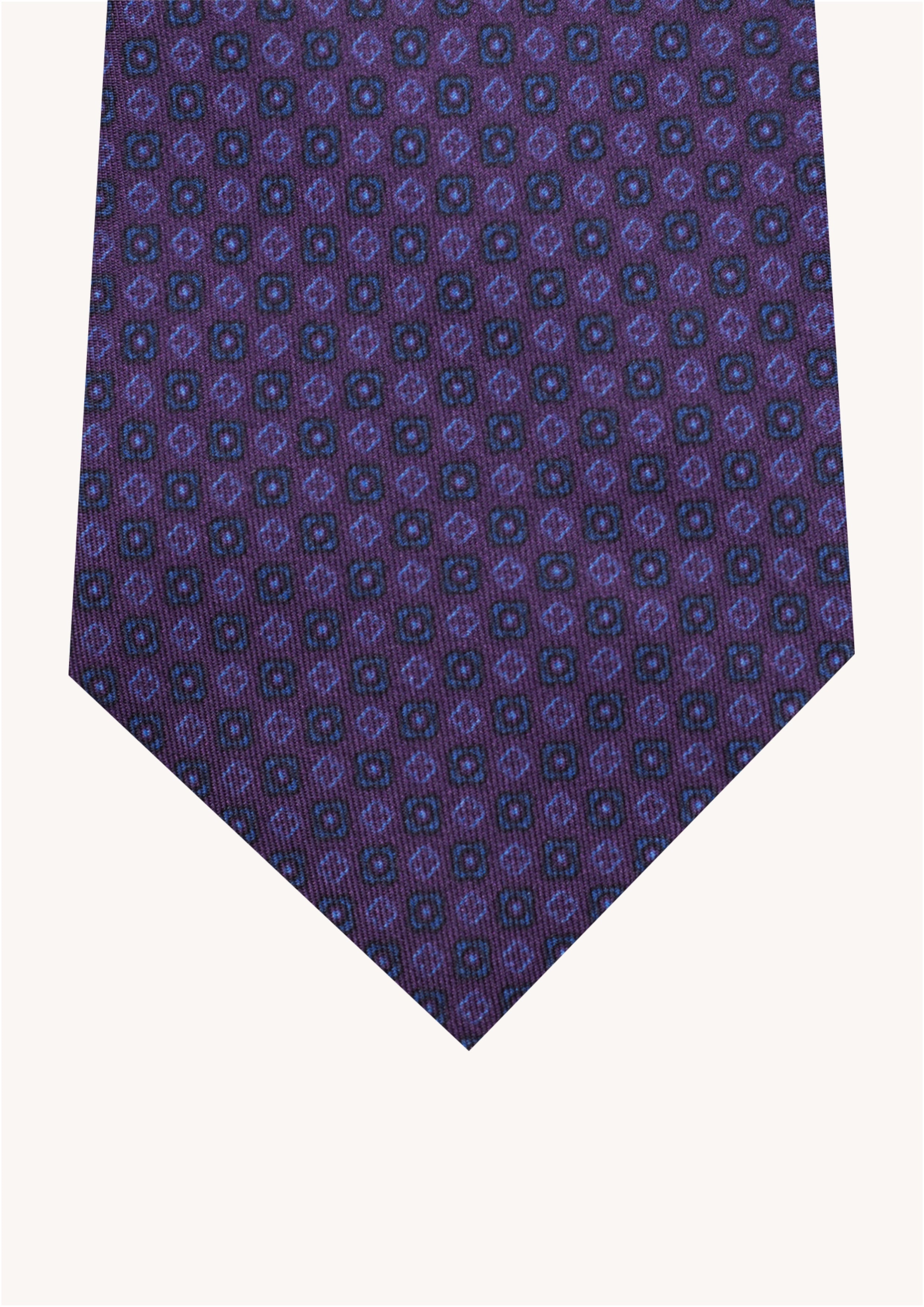 Cravate en twill 100% soie, ornée d'un motif de fleurs bleues sur fond violet