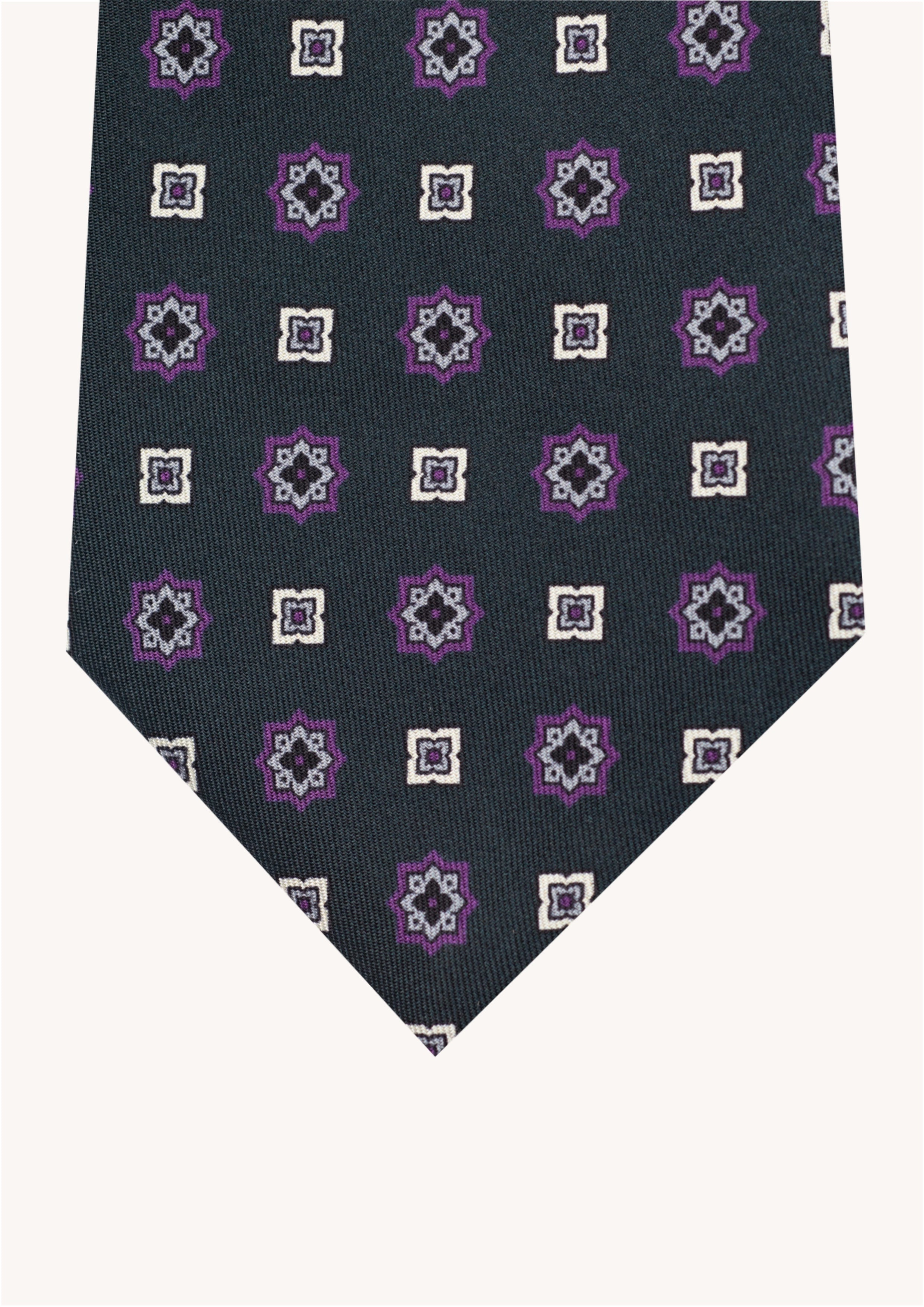 Cravate en twill 100% soie, ornée d'un motif de fleurs blanches et violettes sur fond vert foncé