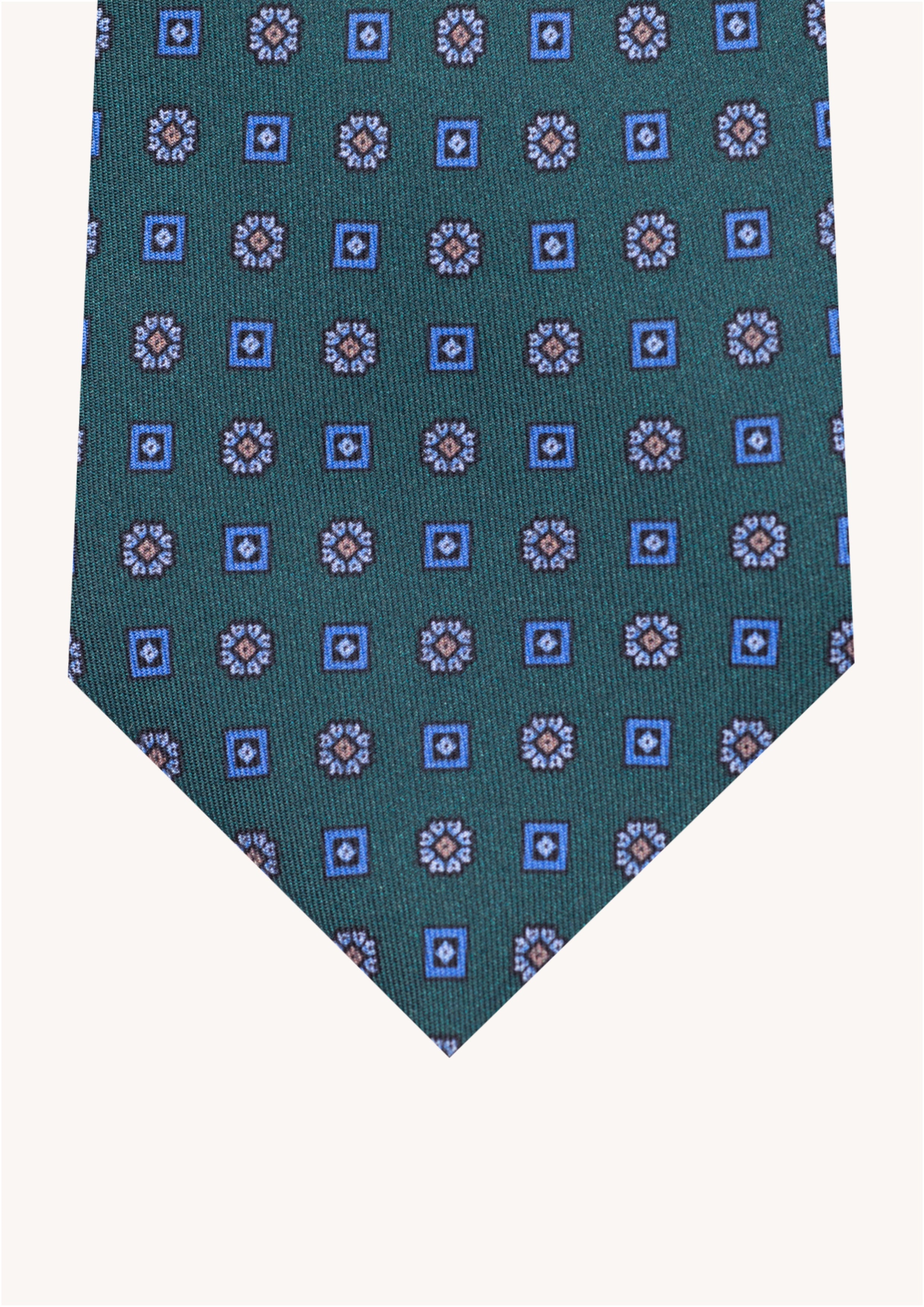 Cravate en twill 100% soie, ornée d'un motif de fleurs bleues sur fond vert