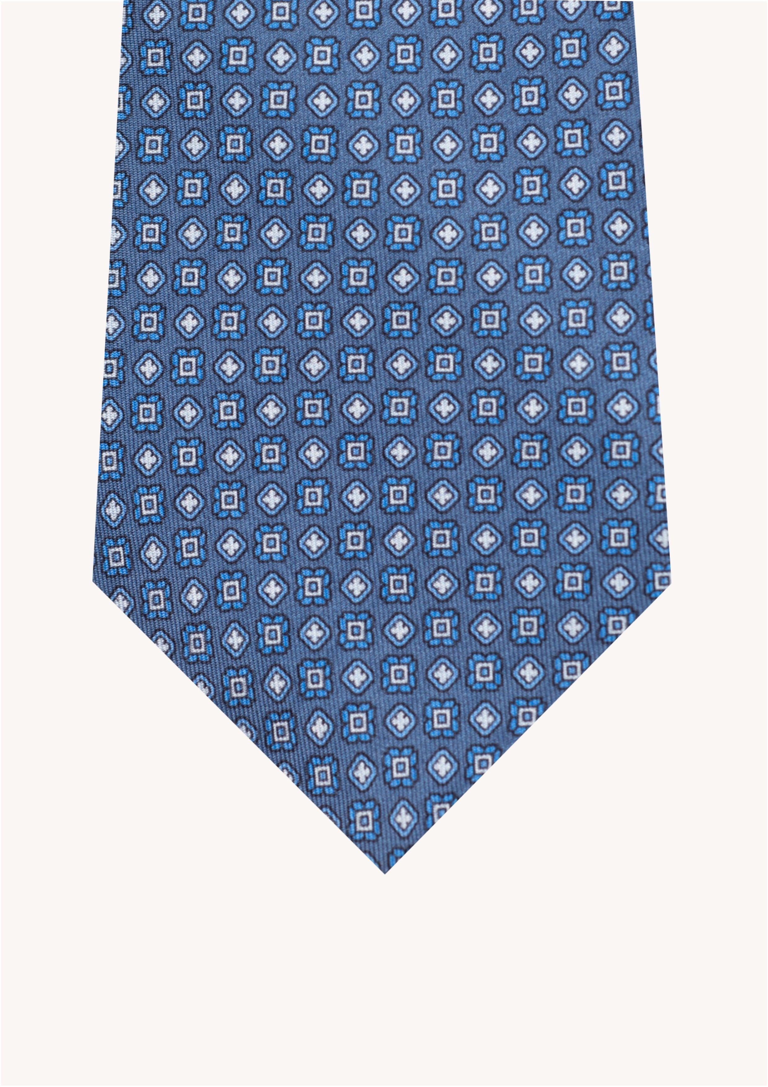 Cravate en twill 100% soie, ornée d'un motif de fleurs bleues et blanches sur fond bleu