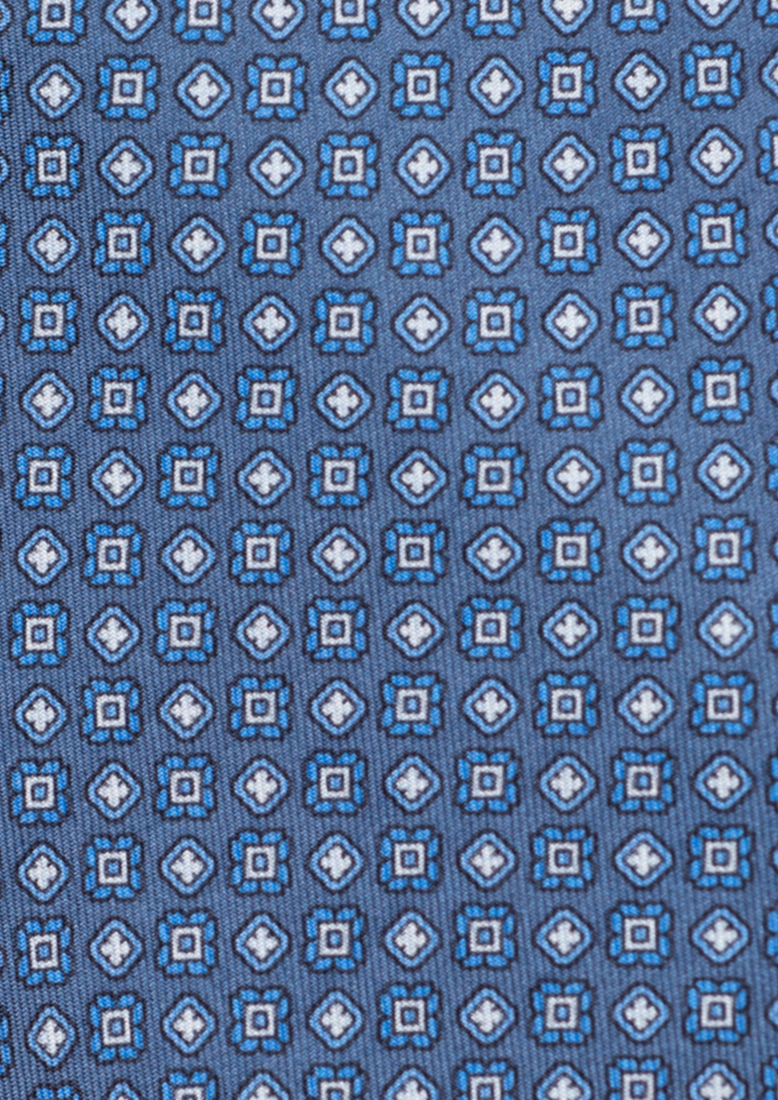 Cravate en twill 100% soie, ornée d'un motif de fleurs bleues et blanches sur fond bleu