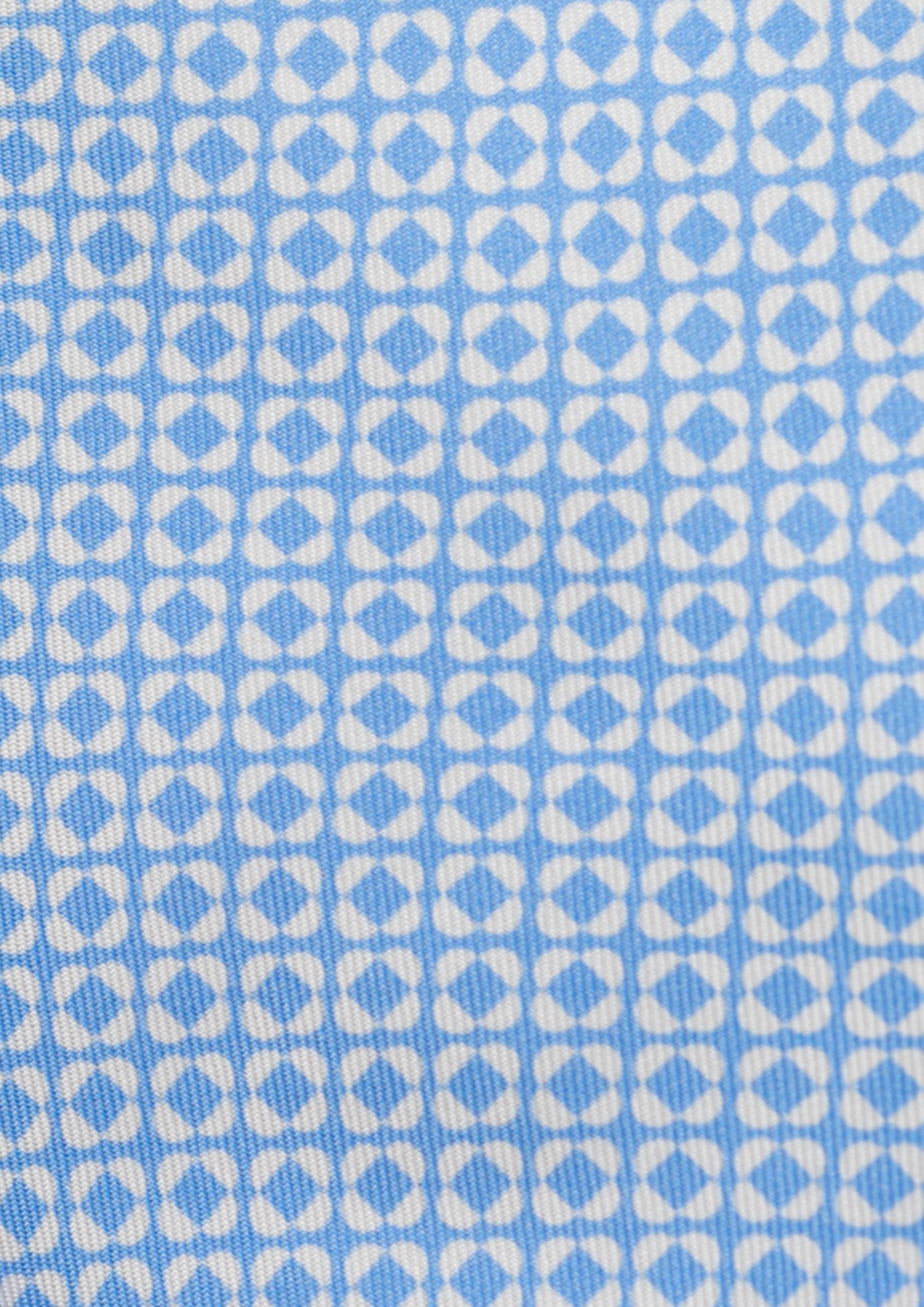 Cravate en twill 100% soie, ornée d'un motif de fleurs blanches sur fond bleu