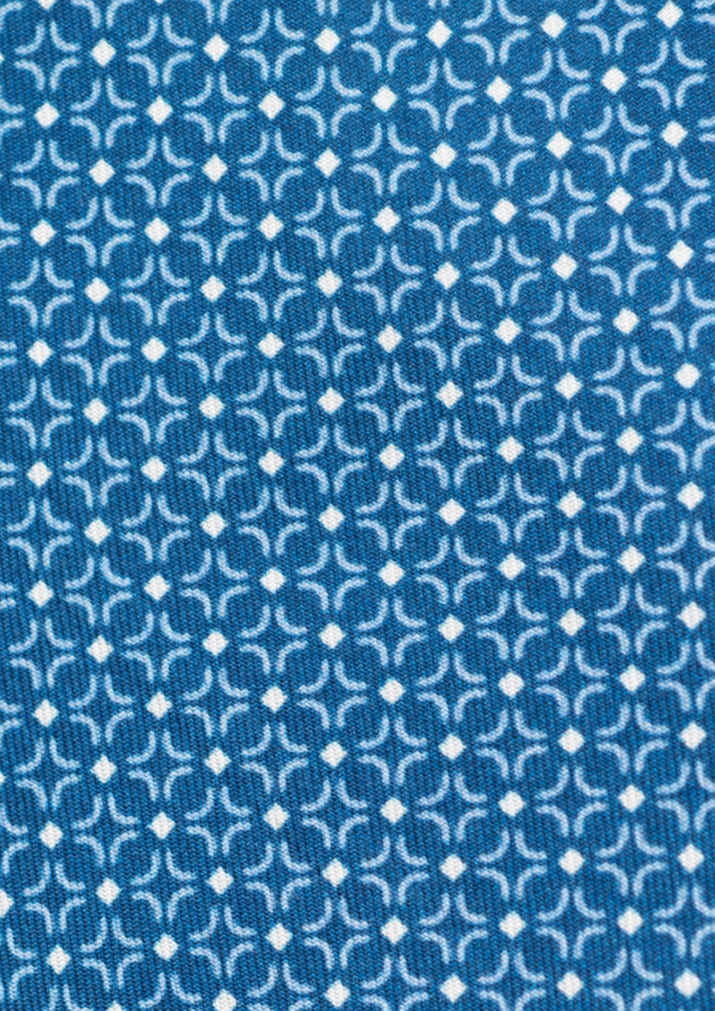 Cravate en twill 100% soie, ornée d'un motif de fleurs bleues et blanches sur fond bleu