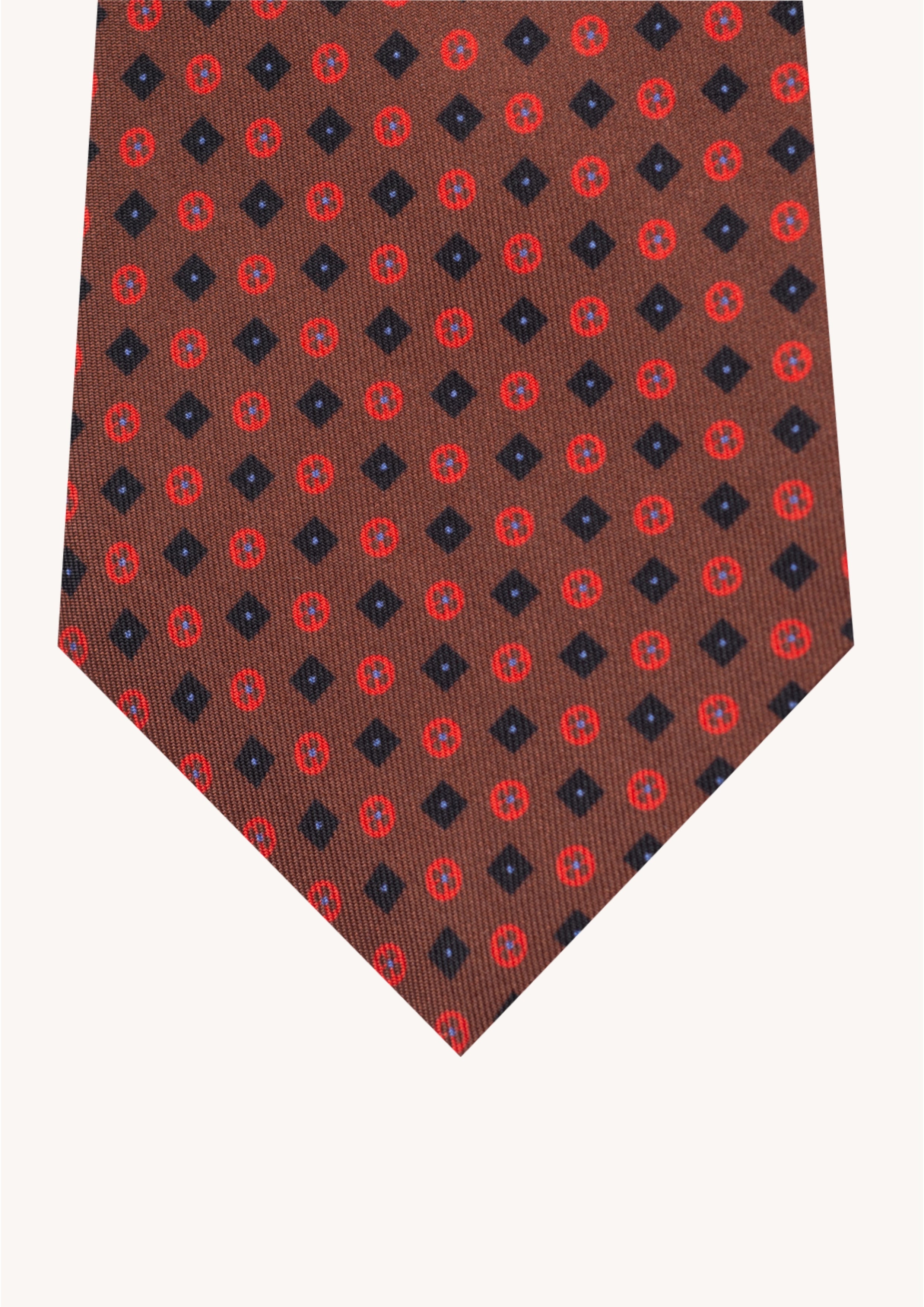 Cravate en twill 100 % soie, ornée d’un motif de fleurs bleu nuit et rouge sur fond marron