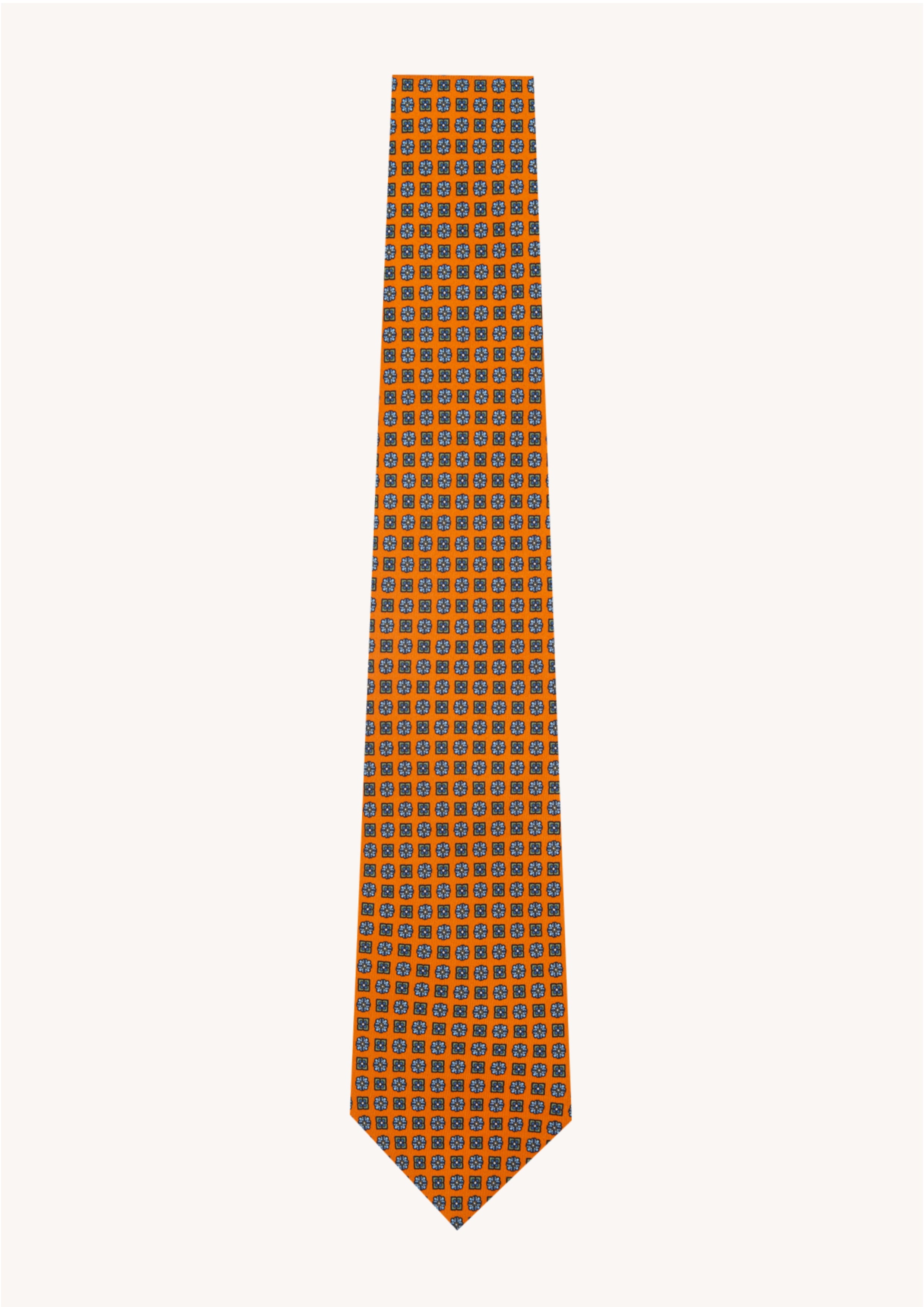 Cravate en twill 100% soie, ornée d'un motif de fleurs bleues sur fond orange