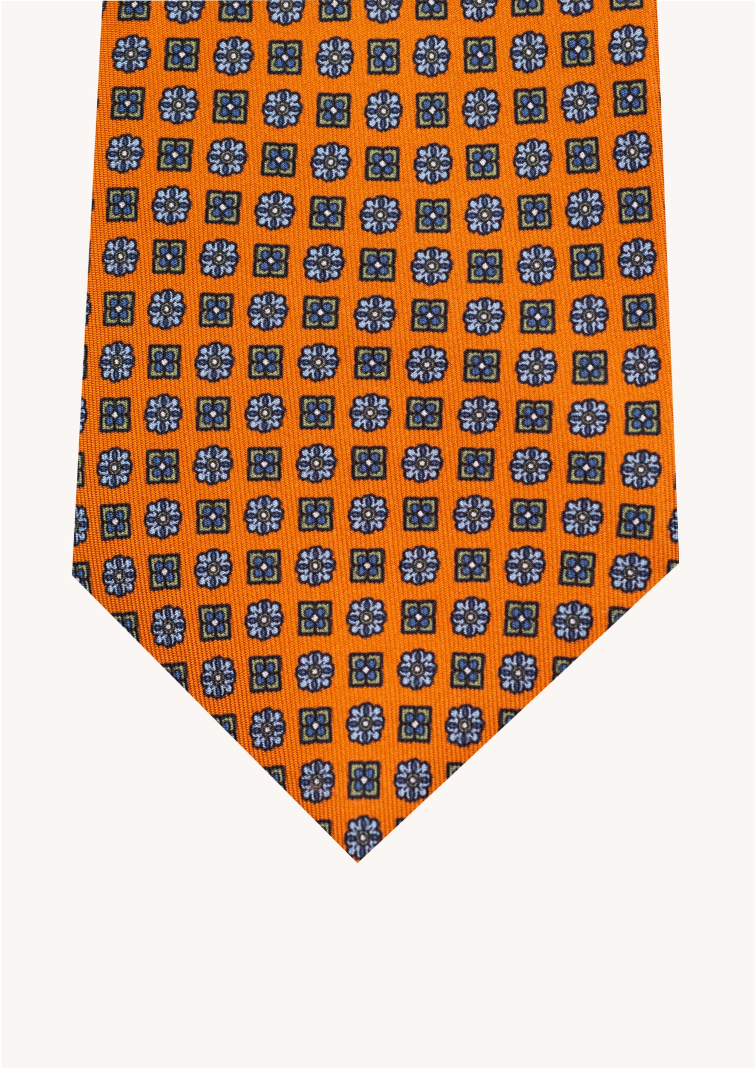 Cravate en twill 100% soie, ornée d'un motif de fleurs bleues sur fond orange