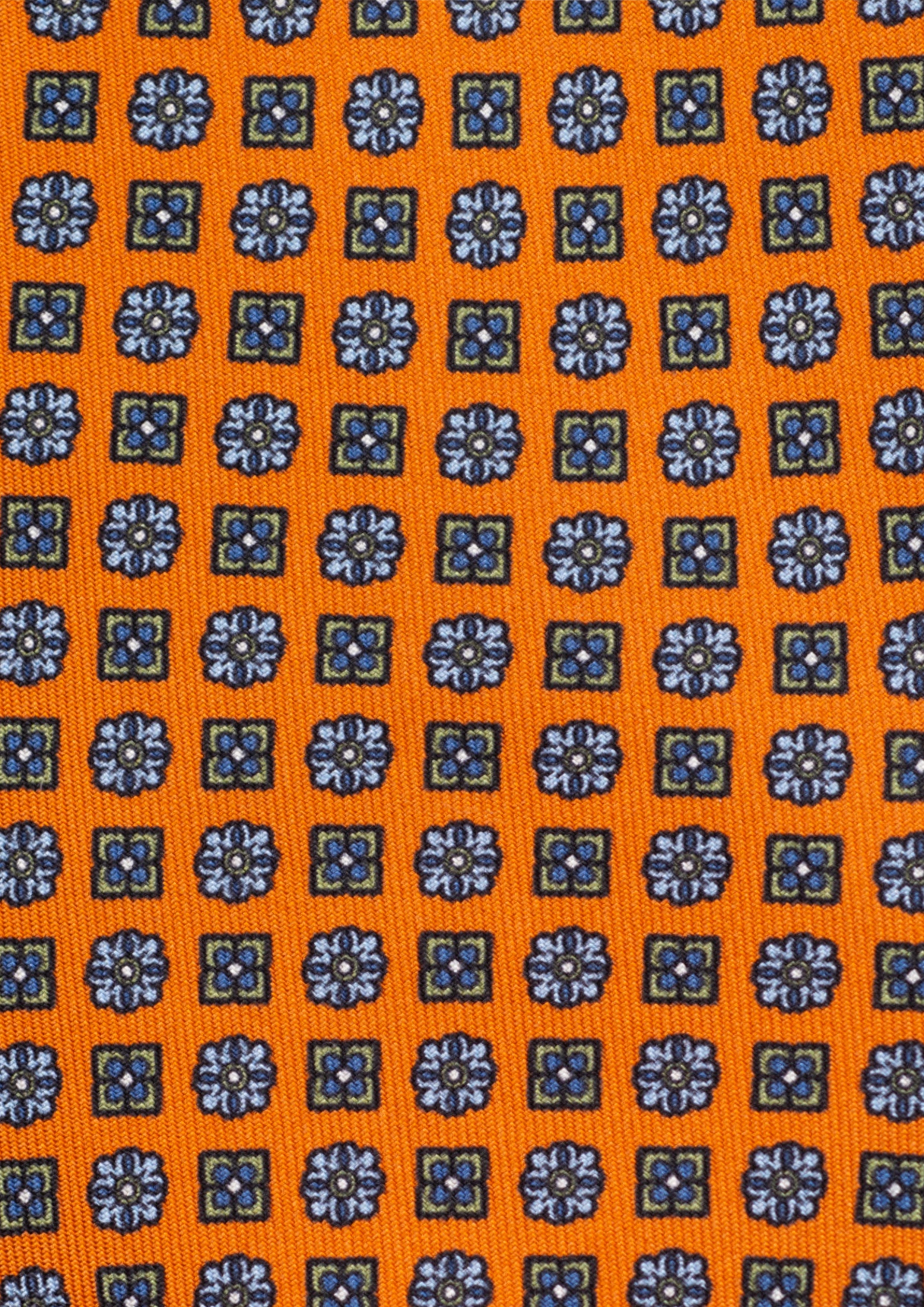 Cravate en twill 100% soie, ornée d'un motif de fleurs bleues sur fond orange