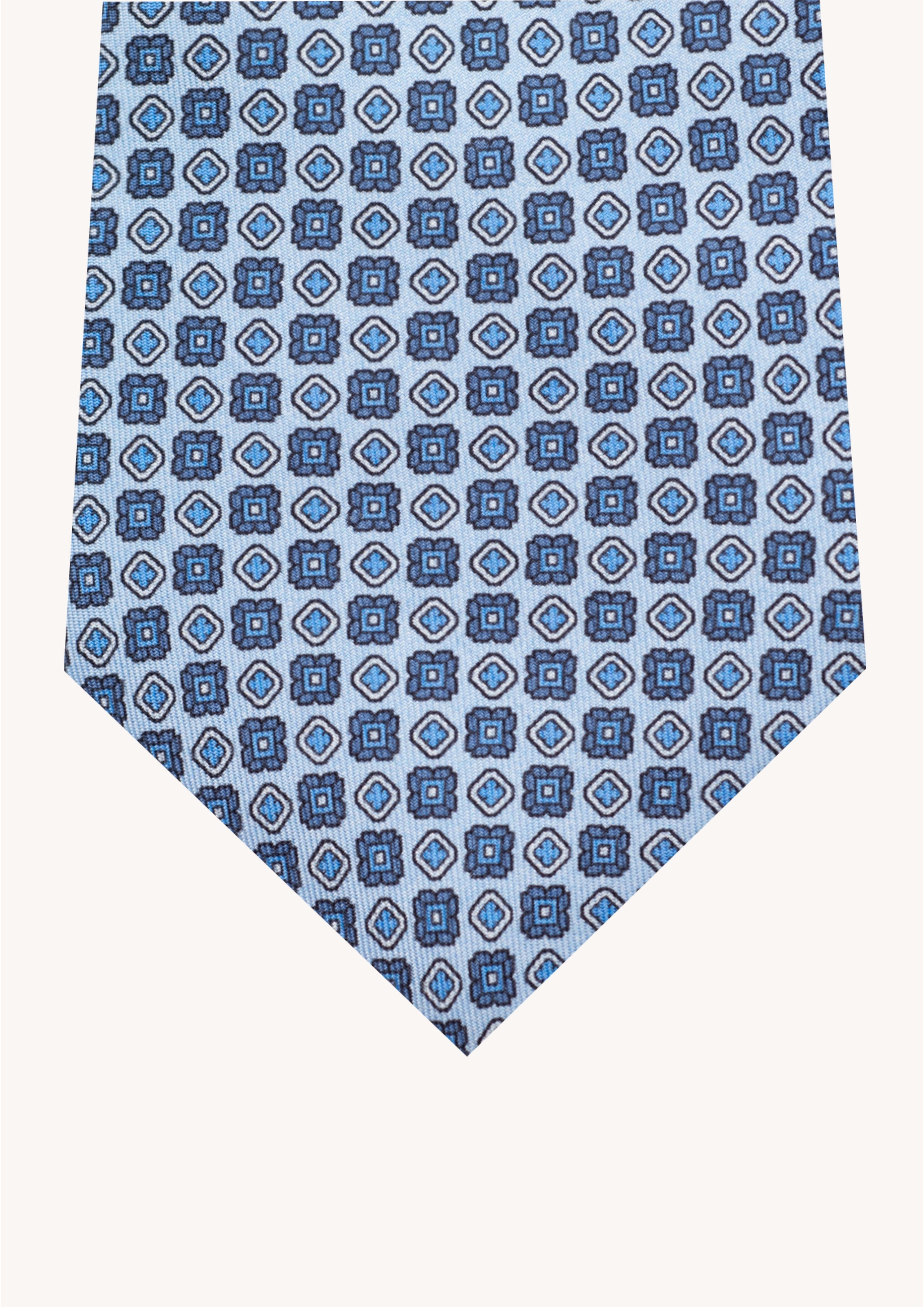 Cravate en twill 100 % soie, ornée d'un motif de fleurs bleues sur fond bleu ciel