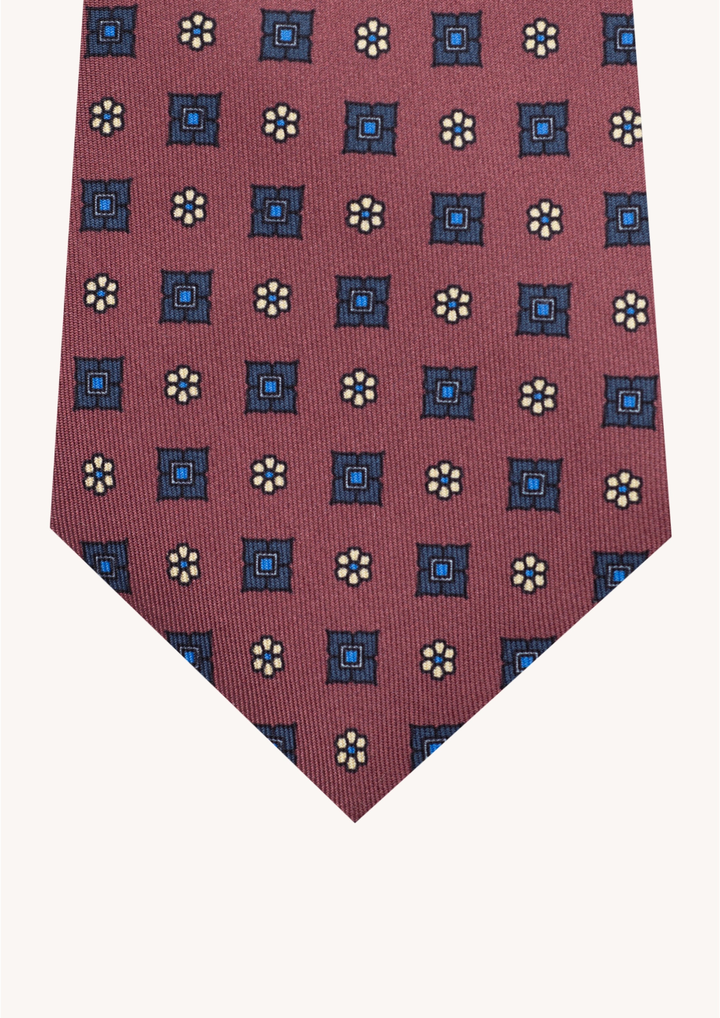 Cravate en twill 100% soie, ornée d'un motif de fleurs bleues sur fond marron