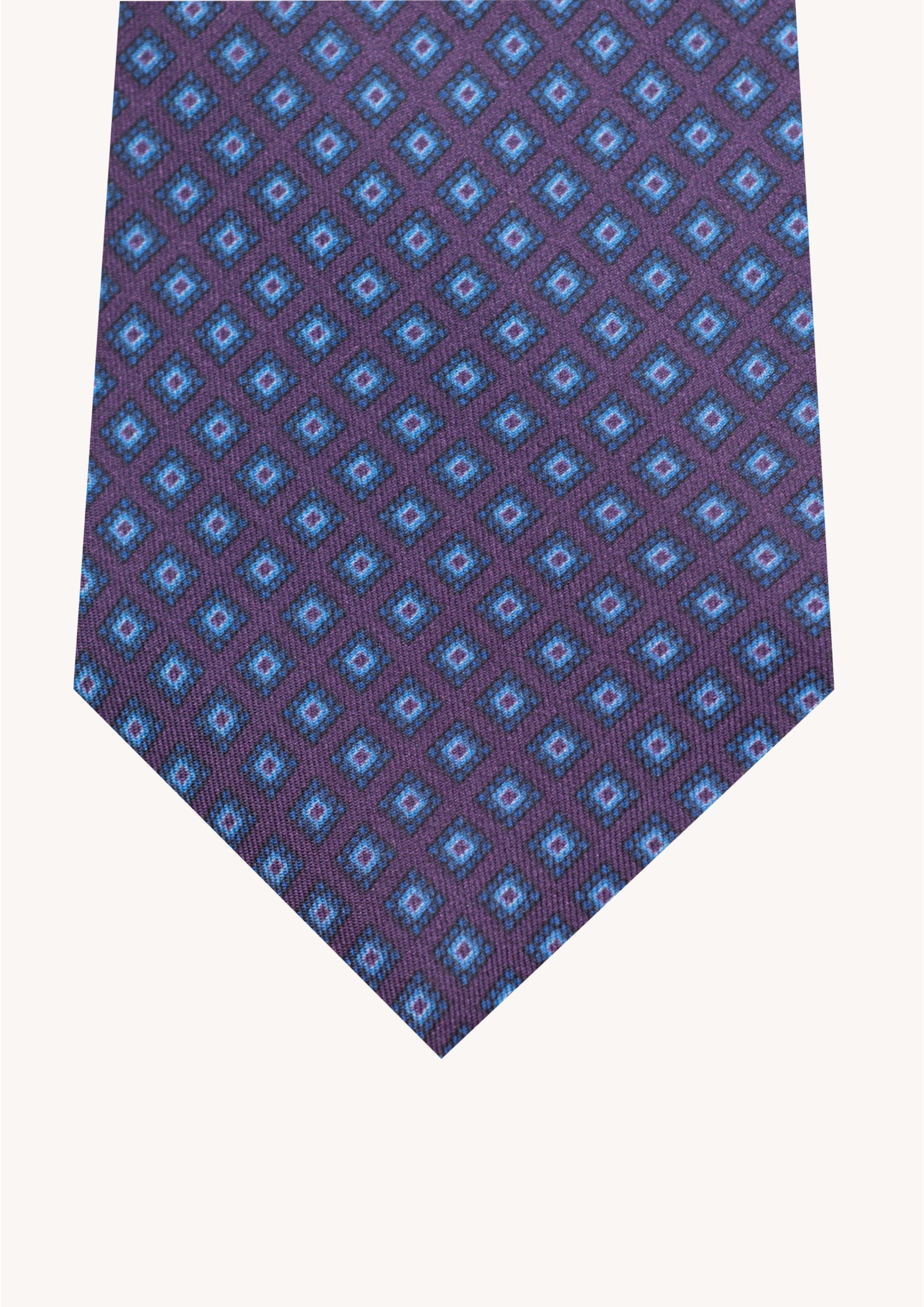 Cravate en twill 100% soie, ornée d'un motif carré bleu sur fond violet