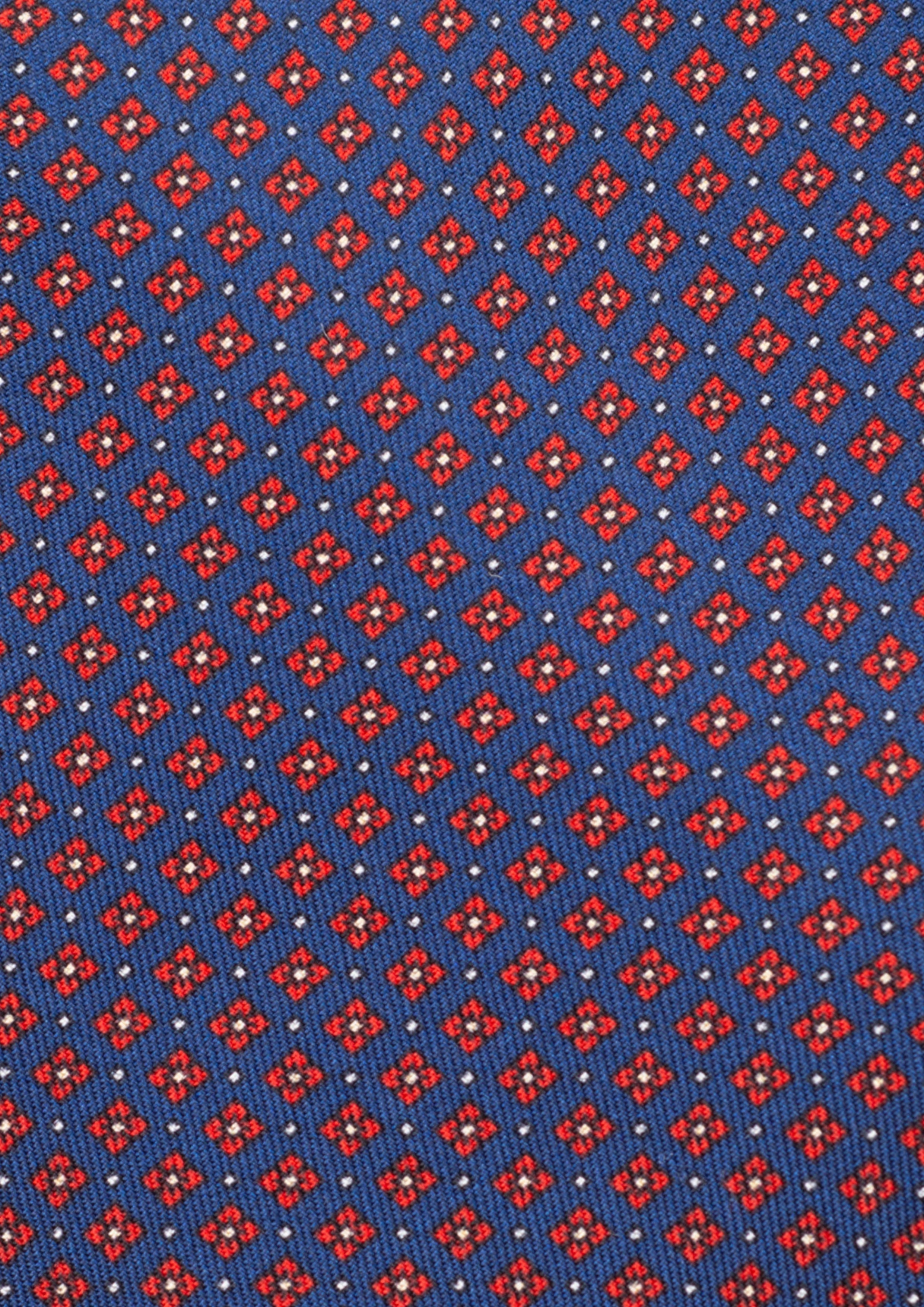 Cravate en twill 100% soie, ornée d'un motif de fleurs rouges sur fond bleu