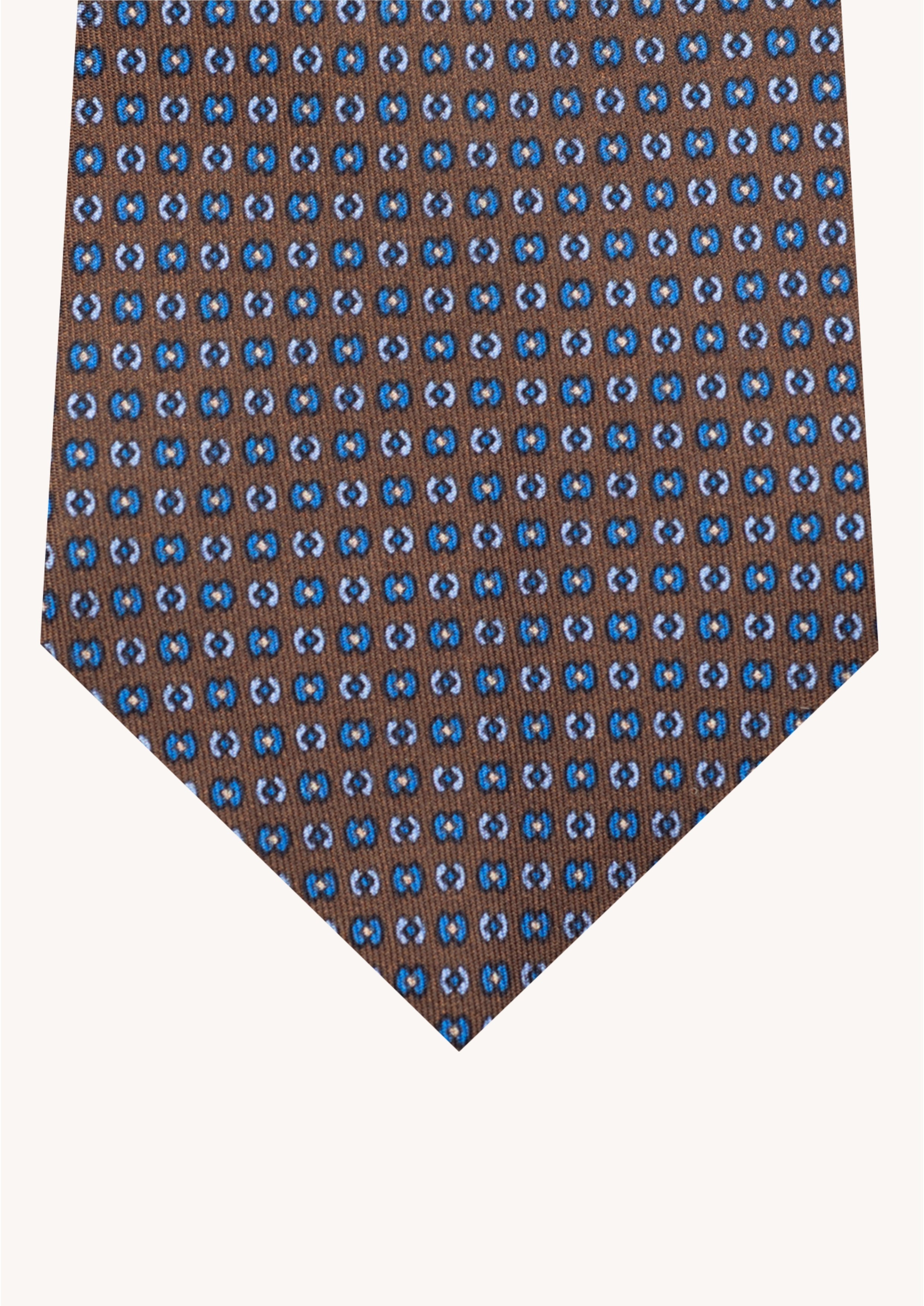 Cravate en twill 100% soie, ornée d'un motif bleu sur fond marron