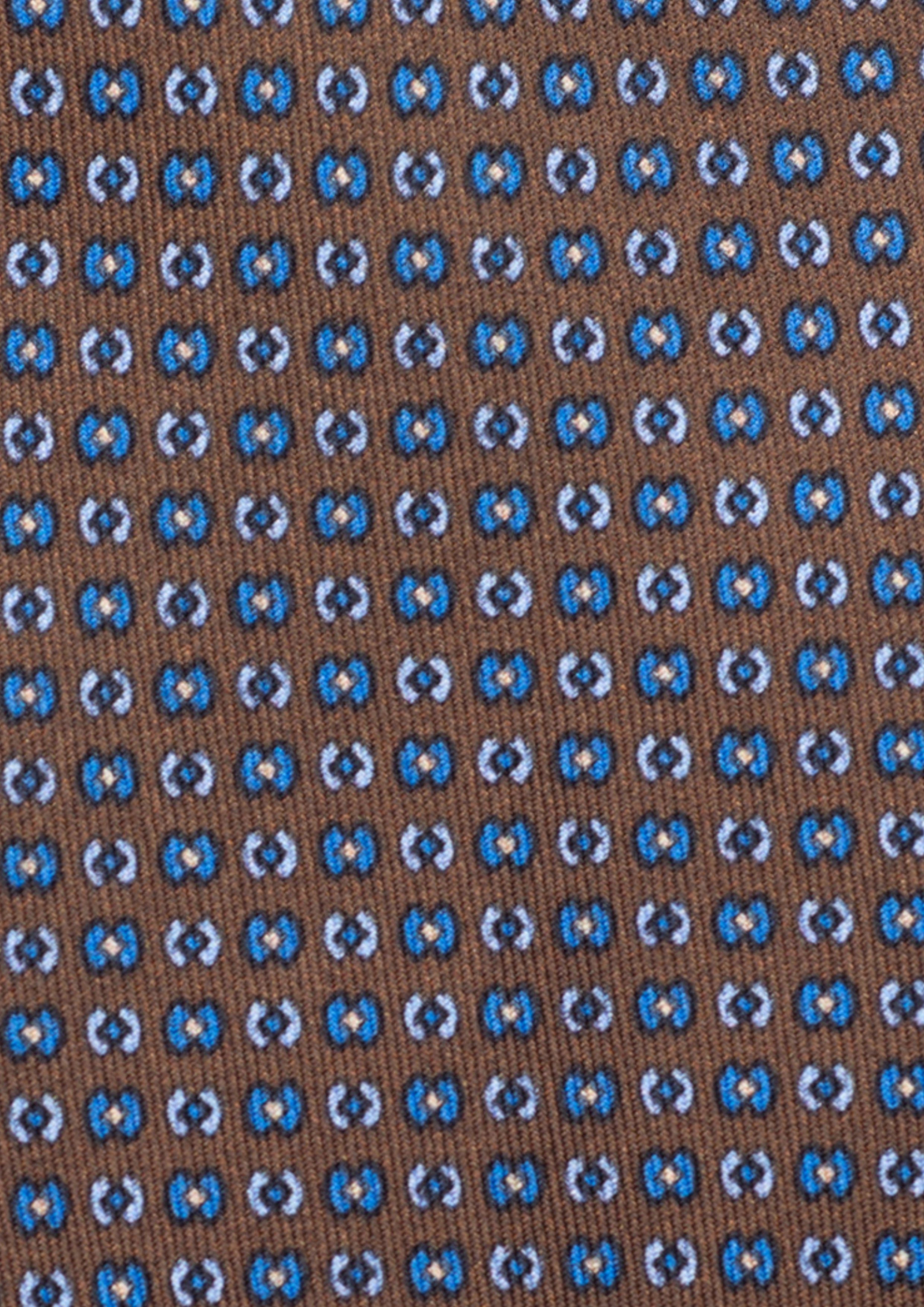 Cravate en twill 100% soie, ornée d'un motif bleu sur fond marron