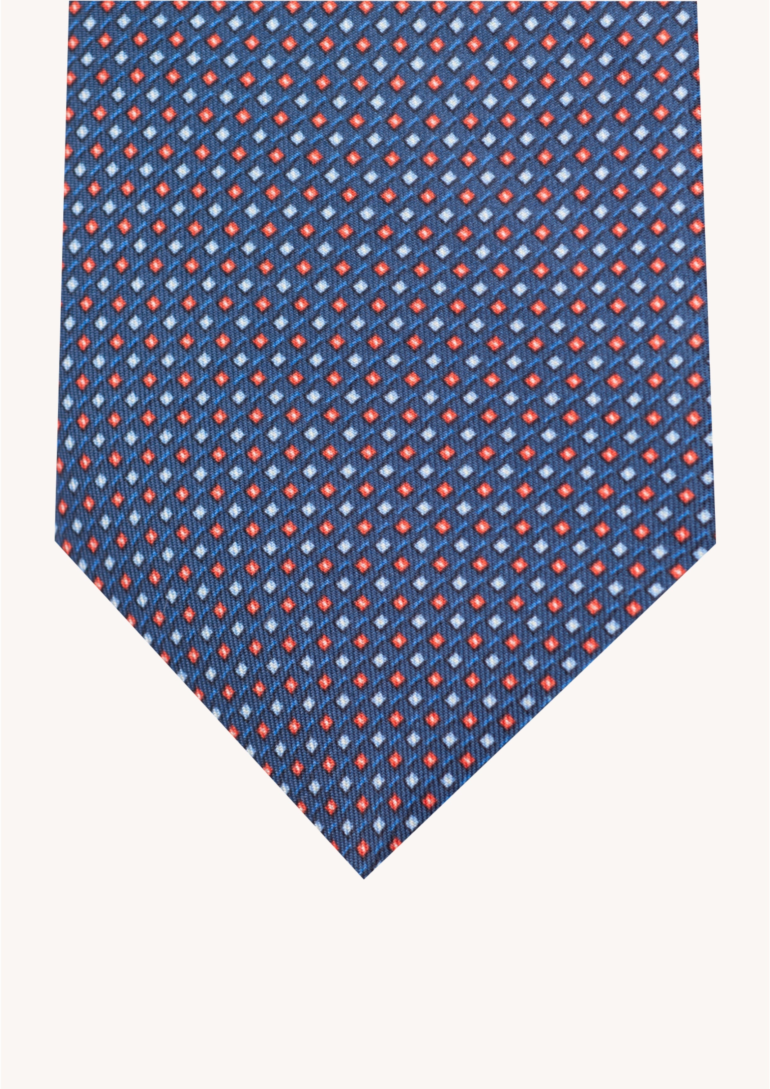 Cravate en twill 100% soie, ornée d'un motif géométrique rouge et bleu sur fond bleu