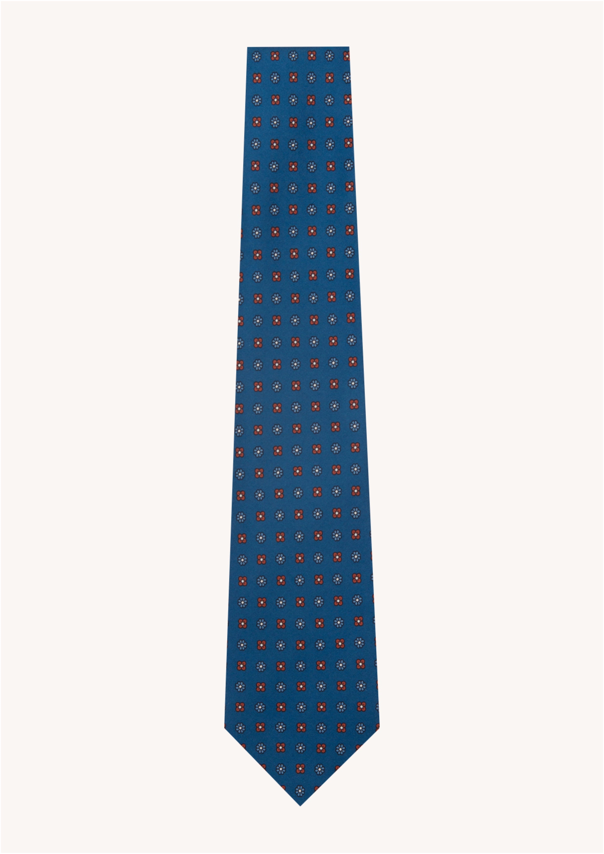 Cravate en twill 100% soie, ornée d'un motif de fleurs bleues et rouges sur fond bleu