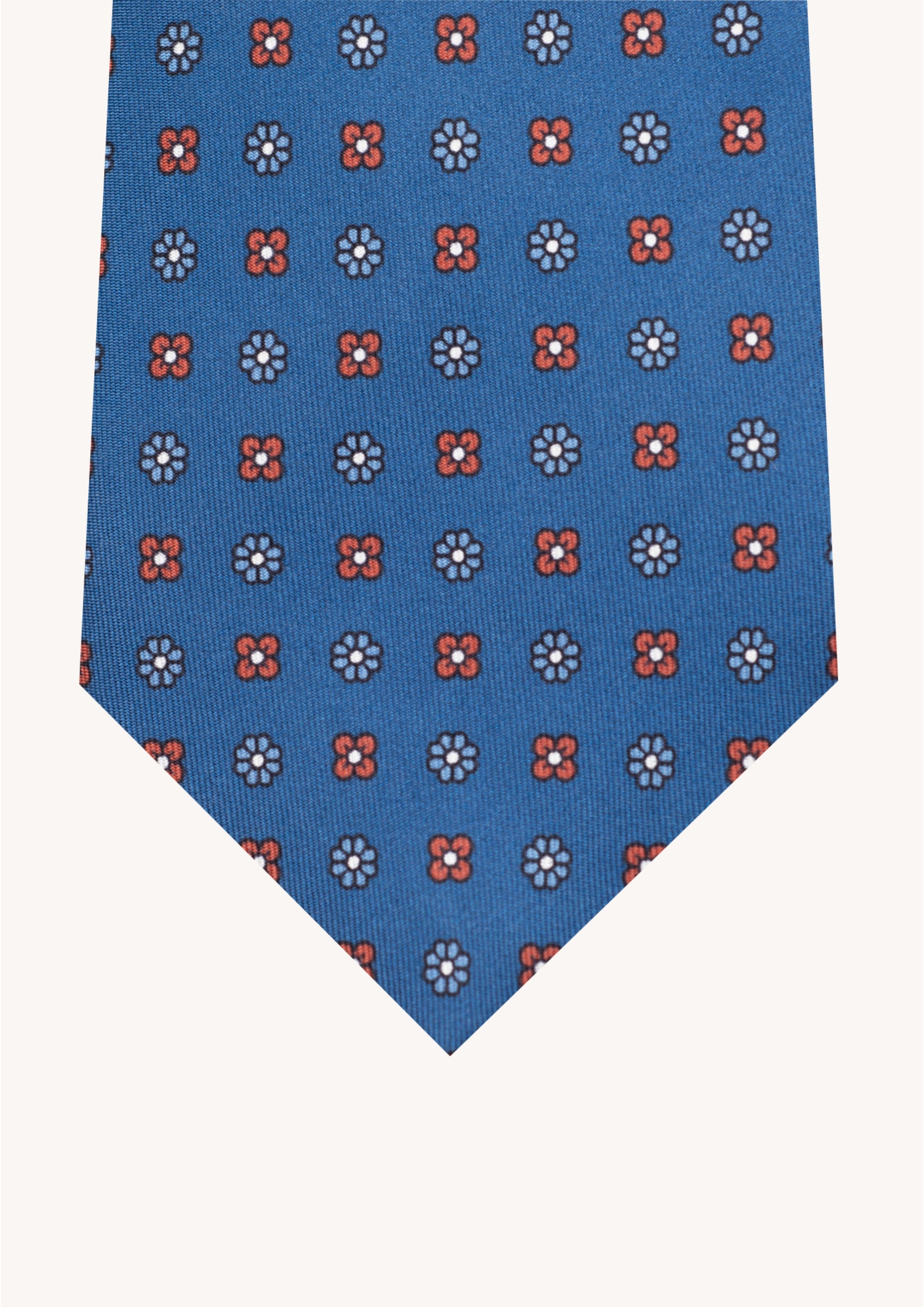 Cravate en twill 100% soie, ornée d'un motif de fleurs bleues et rouges sur fond bleu