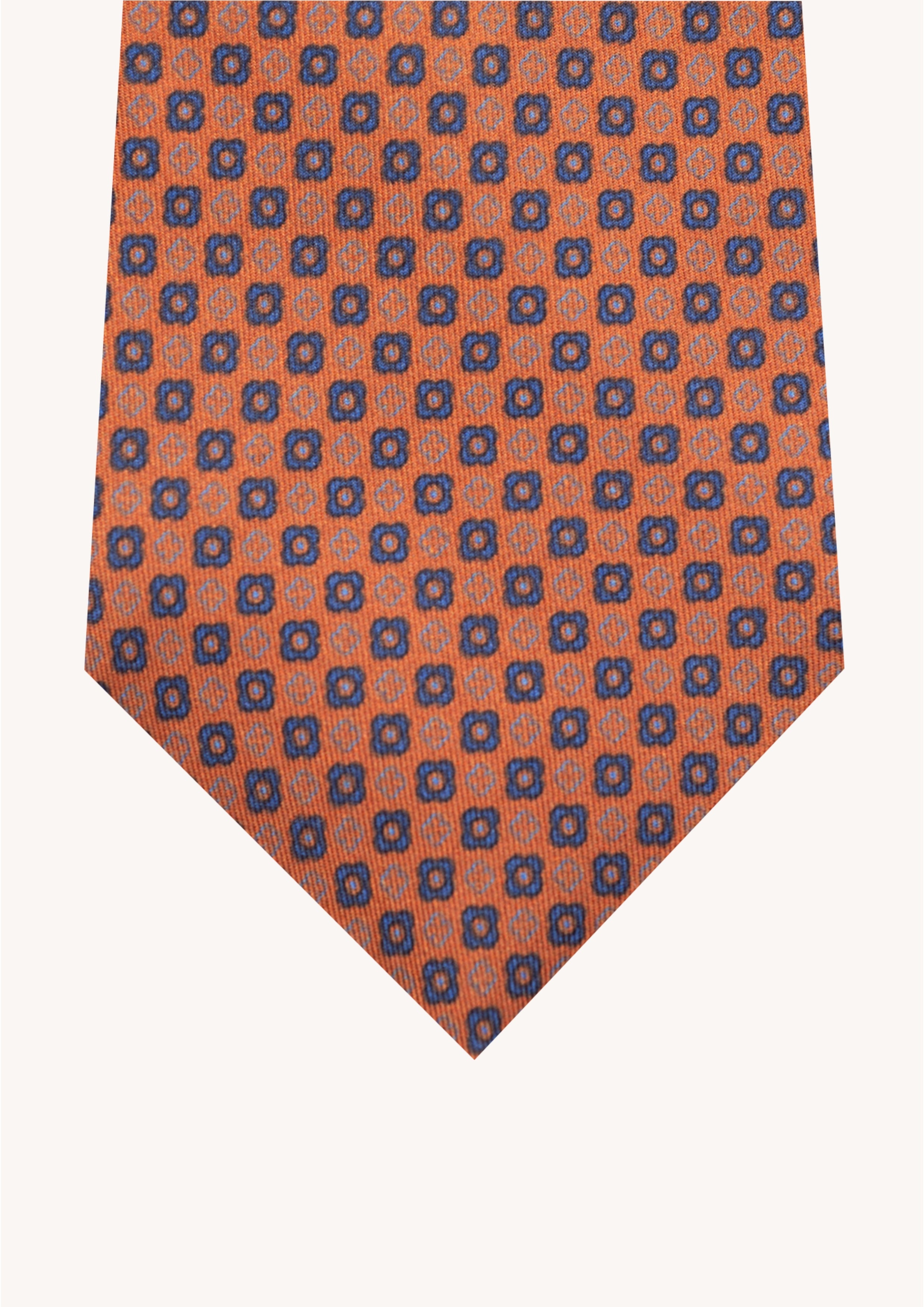 Cravate en twill 100% soie, ornée d'un motif de fleurs bleu sur fond orange
