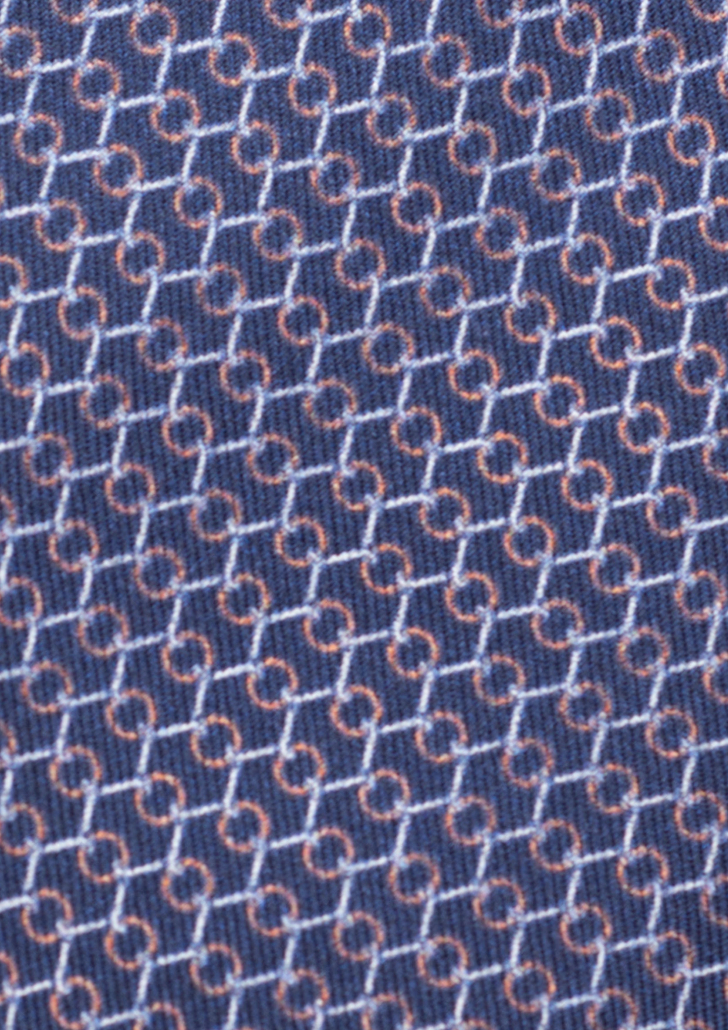 Cravate en twill 100% soie, ornée d'un motif géométrique orange et blanc sur fond bleu