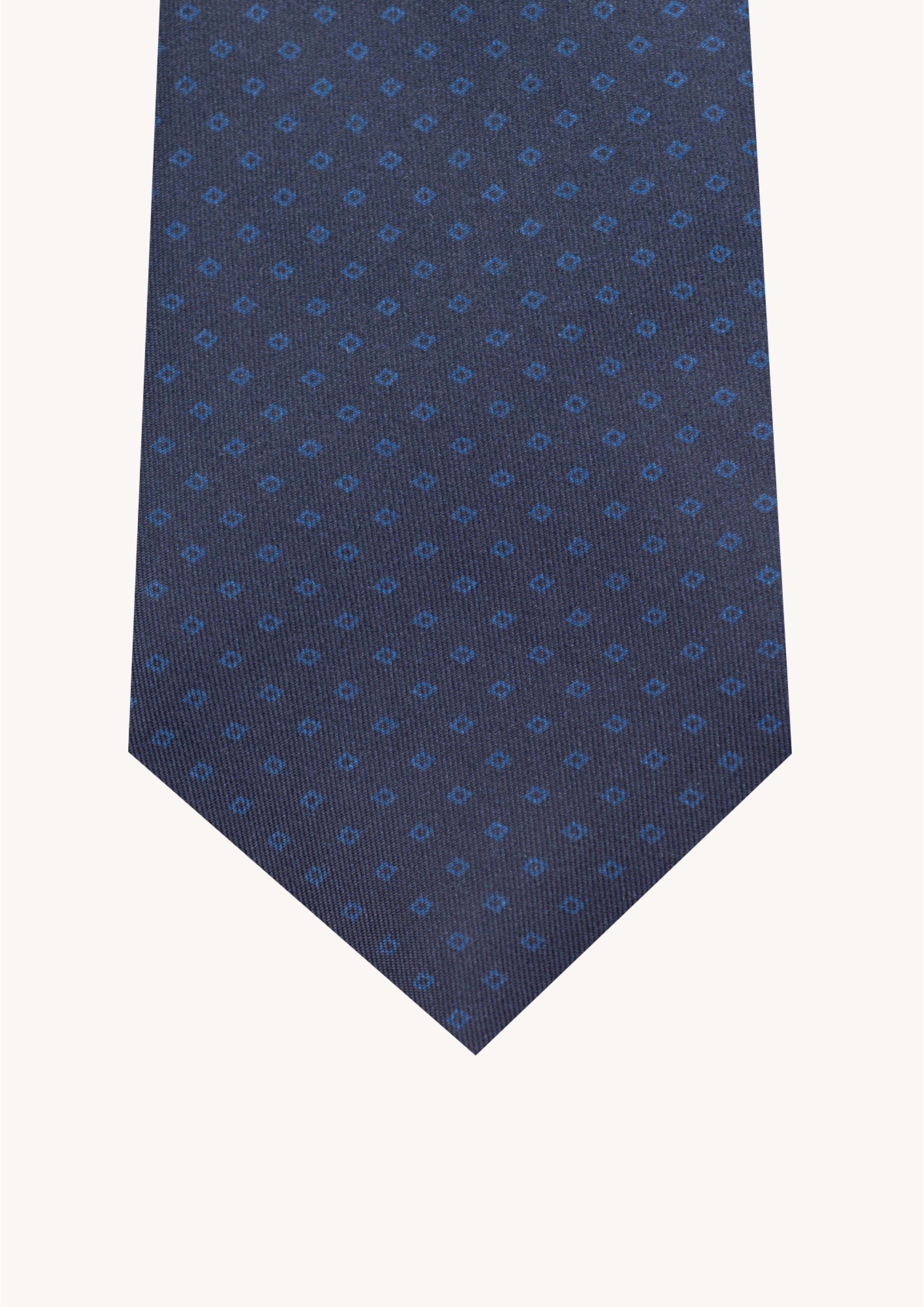 Cravate en twill 100% soie, ornée d'un motif de losanges bleus sur fond bleu