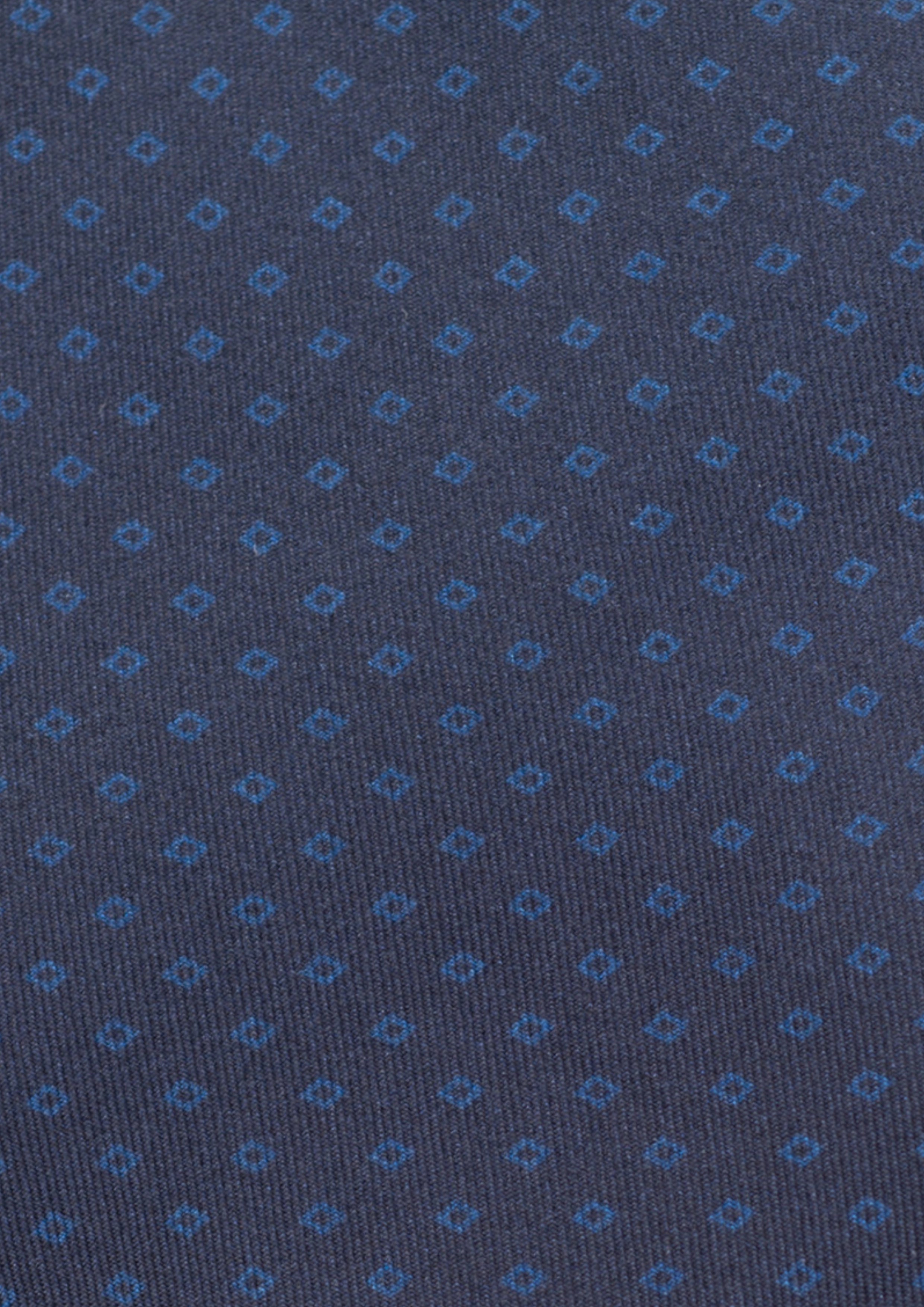 Cravate en twill 100% soie, ornée d'un motif de losanges bleus sur fond bleu