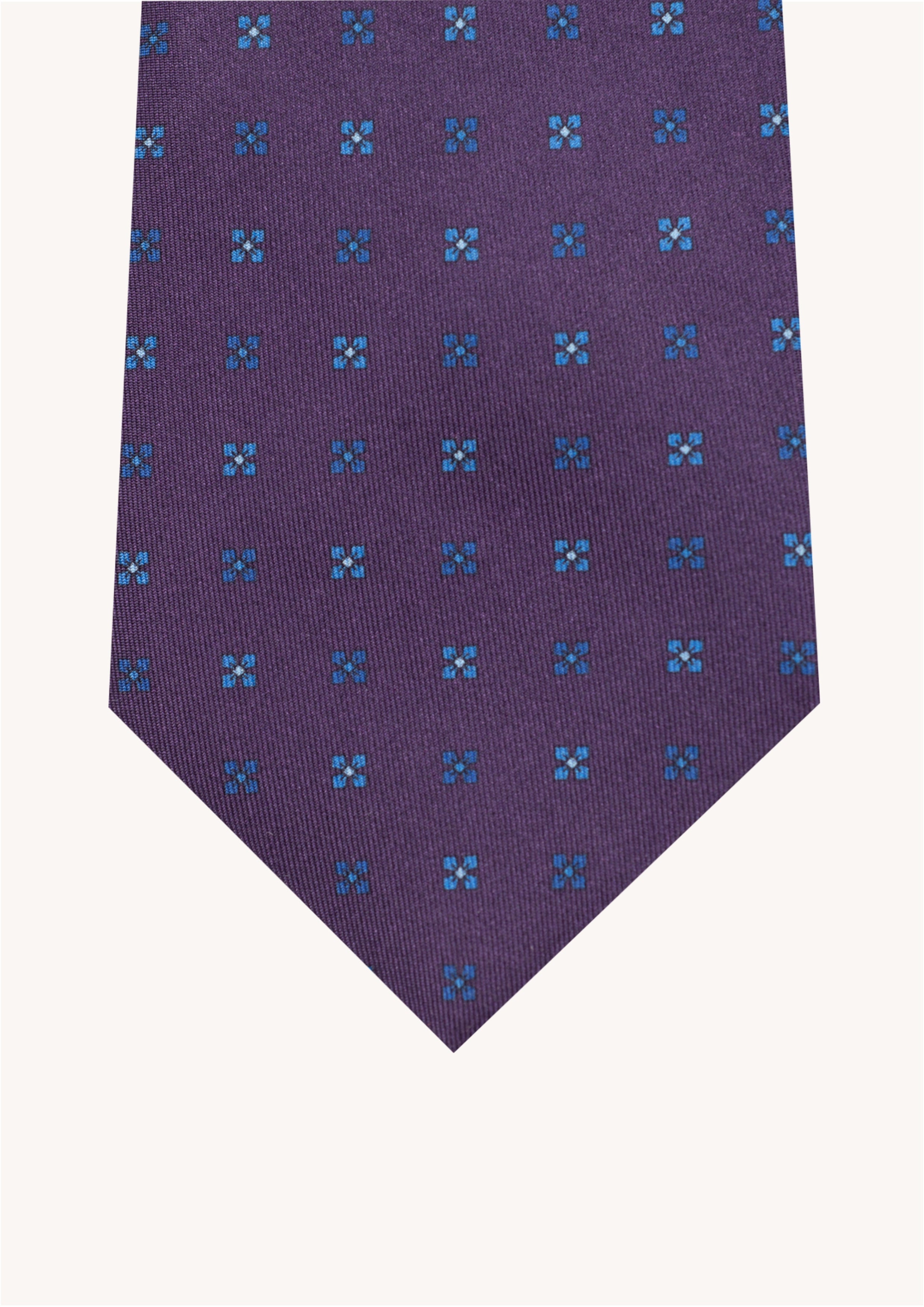 Cravate en twill 100% soie, ornée d'un motif de fleurs bleues sur fond violet