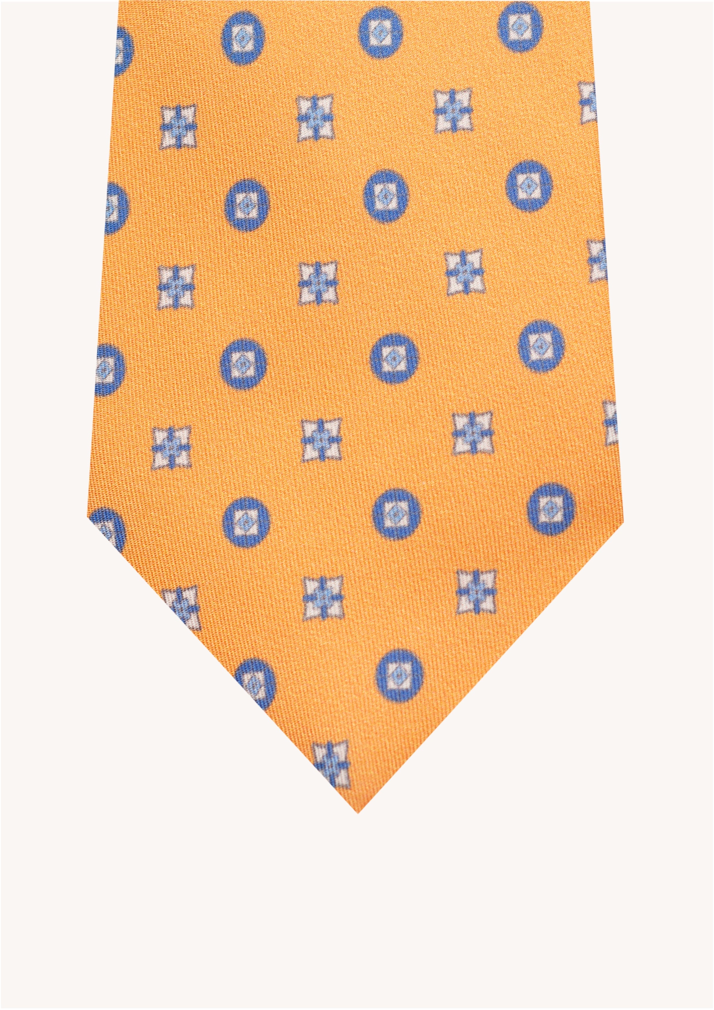 Cravate en twill 100% soie, ornée d'un motif de fleurs bleues sur fond orange
